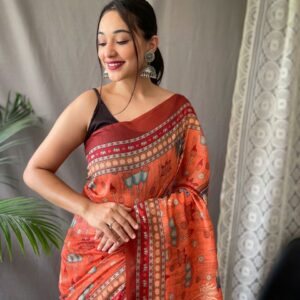 Women's Artistic Terracotta Orange Linen Saree with Kalamkari Inspired Print & Tassel Detailing β Perfect for Casual Festivities & Cultural Events